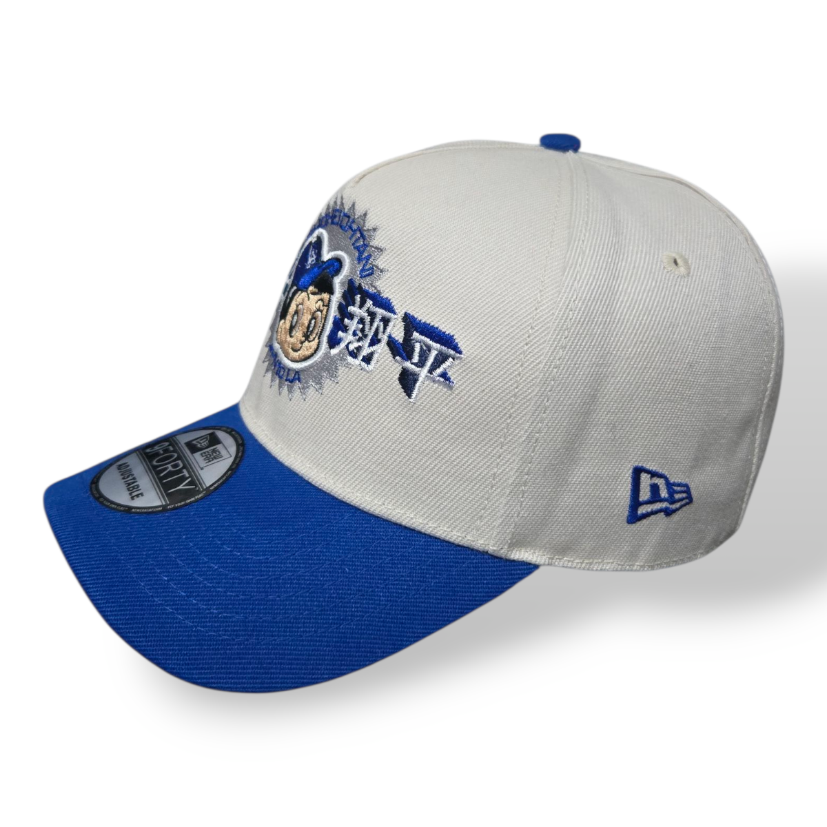 Gorra Blanca y Azul LA – Ajustable 9FORTY Champions 2024