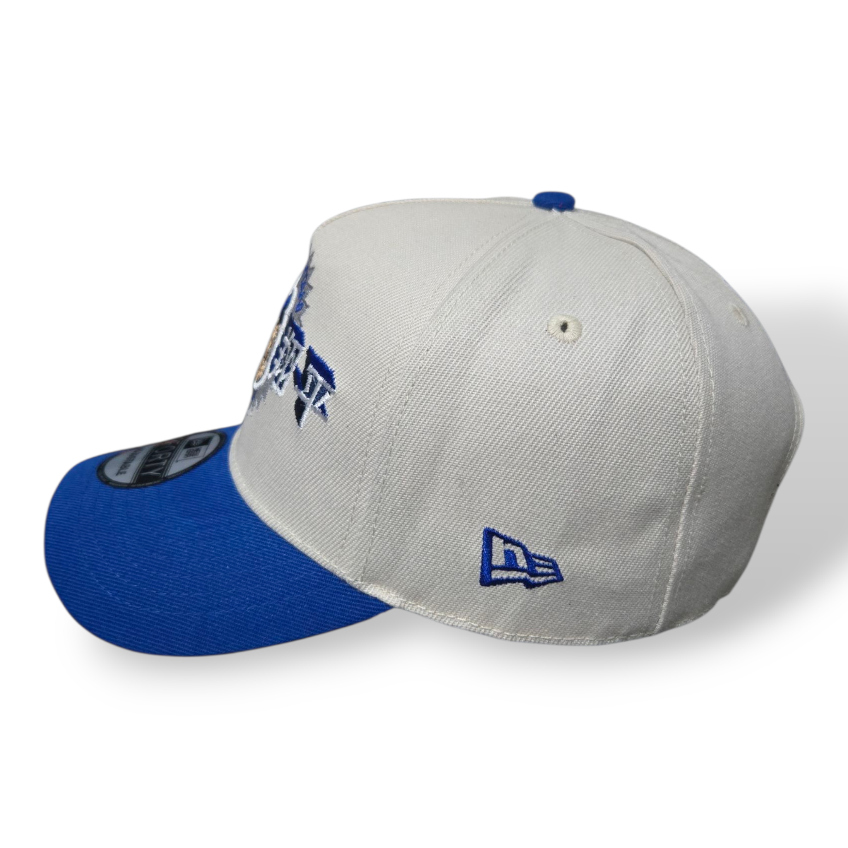Gorra Blanca y Azul LA – Ajustable 9FORTY Champions 2024