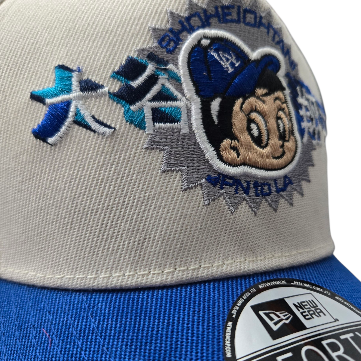 Gorra Blanca y Azul LA – Ajustable 9FORTY Champions 2024