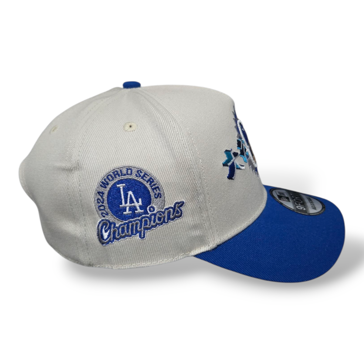 Gorra Blanca y Azul LA – Ajustable 9FORTY Champions 2024